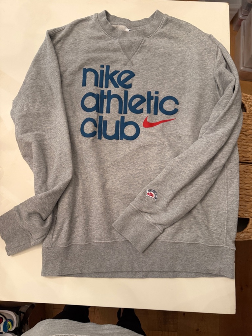 Nike Gray Crewneck Sweatshirt with Blue Logo and Red Swoosh